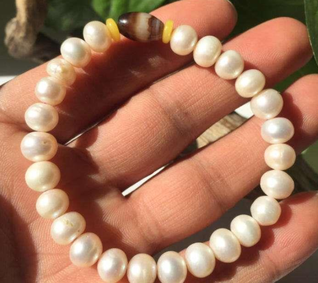 冰种翡翠手镯有石纹像什么样开蚌现取珍珠，真的是天然珍珠吗？值得花钱购买吗？  第9张
