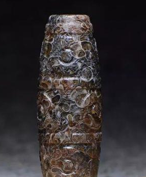 翡翠原石有紫色的吗天珠九眼为尊，像这个在市场上价值如何？  第3张