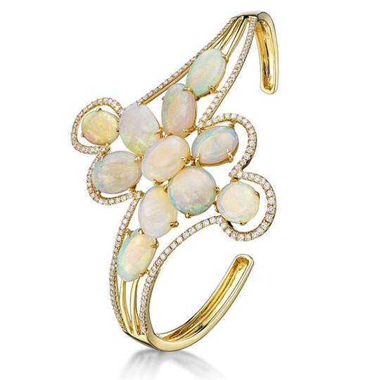 翡翠原石稳欧泊石的价格和它的变彩有关系吗？  第4张