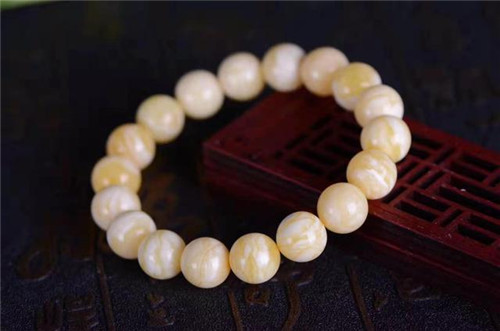 不可不知的几种辨别真假蜜蜡的方法！  第4张