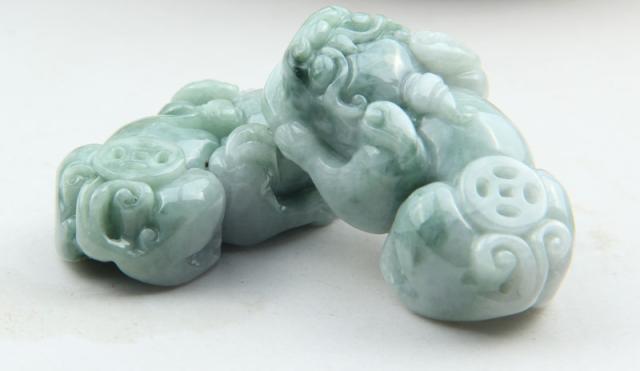 翡翠原石赌石黑乌沙玉貔貅开光的方法 玉貔貅促进学习和事业稳步上升   第2张