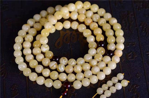 不可不知的几种辨别真假蜜蜡的方法！  第6张