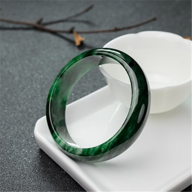 花青种翡翠镯子值钱吗?决定它价格的因素是什么? 第1张