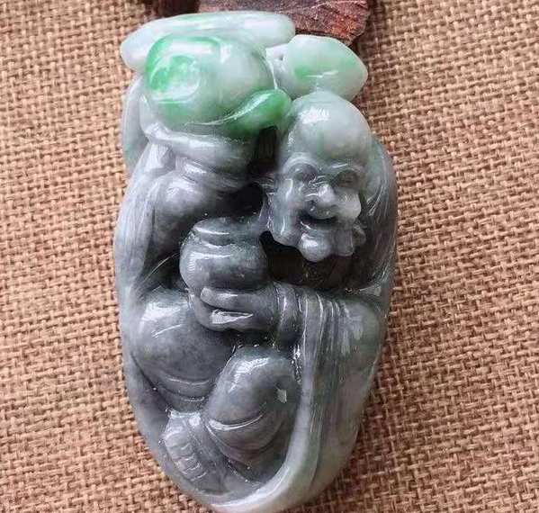 怎么鉴别一块冰种翡翠原石的真伪   第2张