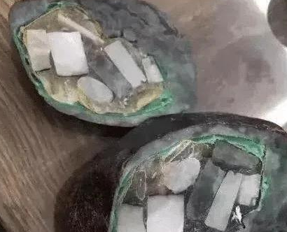 200万的翡翠原石切割导致刀片断裂，里面竟是钢珠螺丝钉   第8张